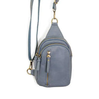 Blue faux leather Skyler Sling Bag with convertible strap, stylish and eco-friendly