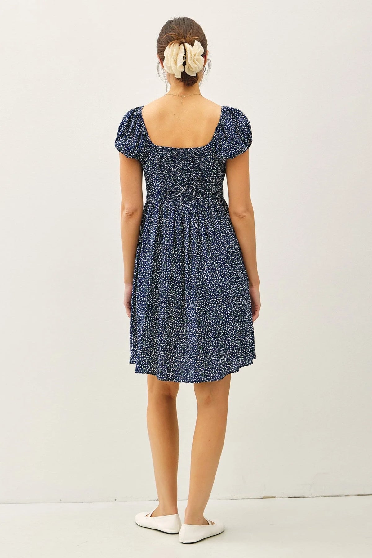Blue floral print mini dress in women’s boho chic clothing collection
