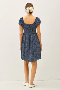 Blue floral print mini dress in women’s boho chic clothing collection