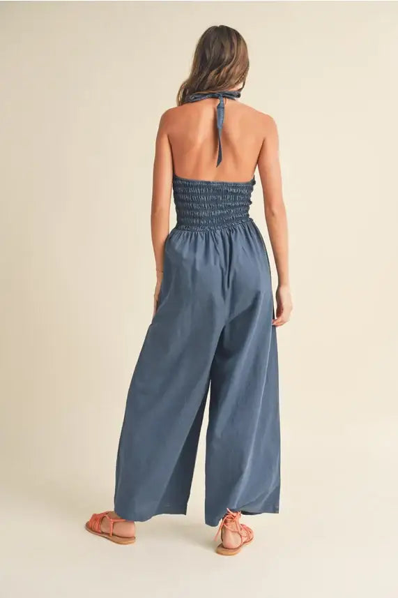 Blue halter-neck jumpsuit from Shop Daisy, perfect for women’s boho chic clothing