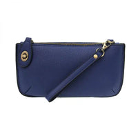 Blue leather wristlet with gold hardware featuring card slots from Shop Daisy