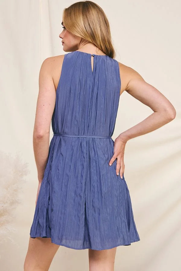 Blue sleeveless dress with gathered waist and pleated skirt in Silky Bamboo Texture