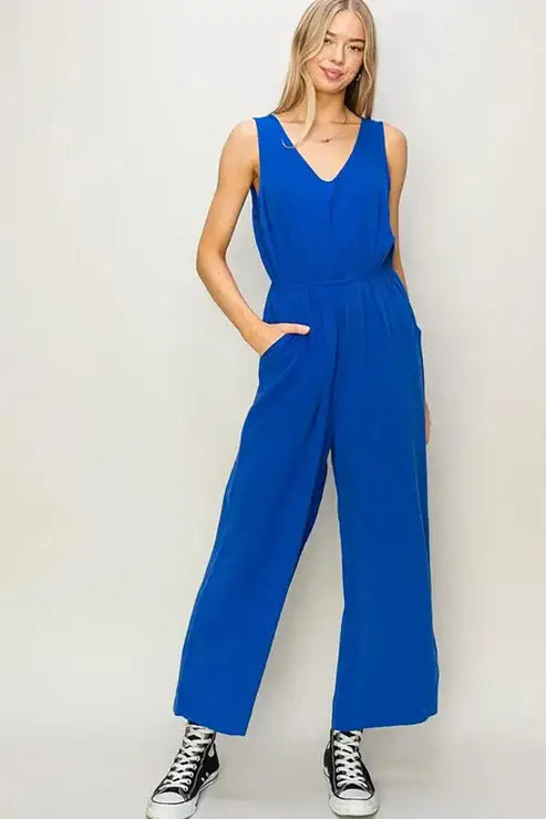 Blue sleeveless linen jumpsuit from Shop Daisy, ideal for women’s boho chic clothing