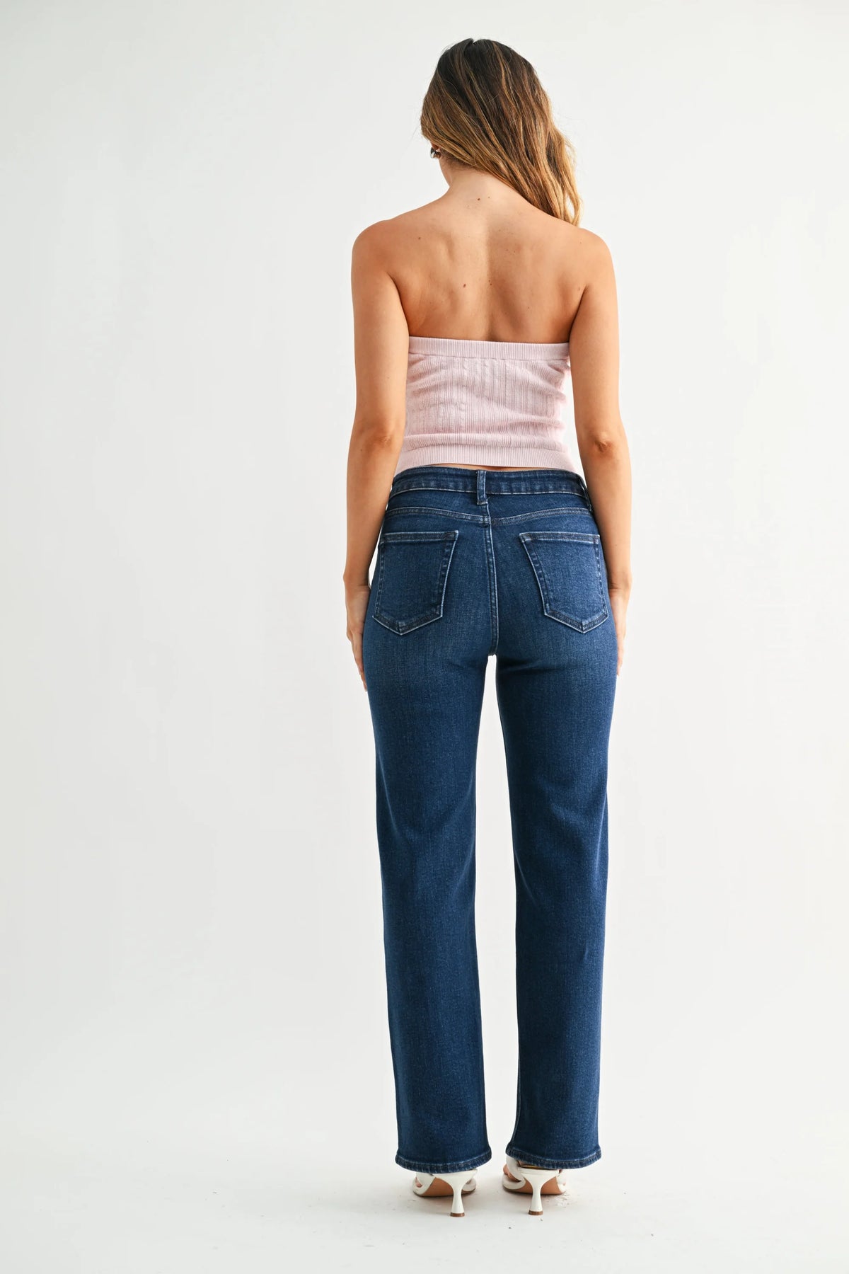Mid rise straight leg denim jean in blue with high-waisted button fly