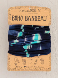 Blue tie tied to a card showcasing the Turquoise Navy Tie-Dye Boho Bandeau headwrap