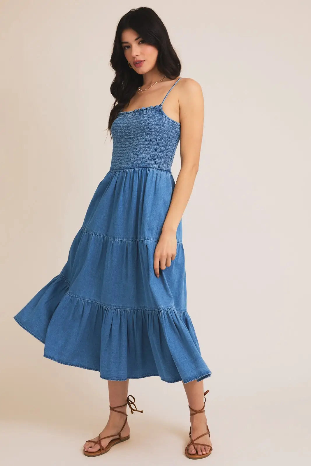 Blue sleeveless smocked tiered dress, a stylish tiered dress midi for summer occasions