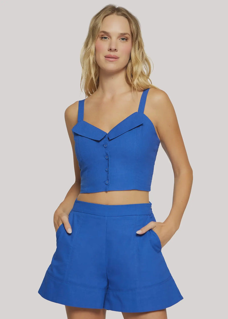 Blue two-piece shorts set featuring the LOST+WANDER COASTAL TIDE VEST TOP, perfect for coastal tide fashion