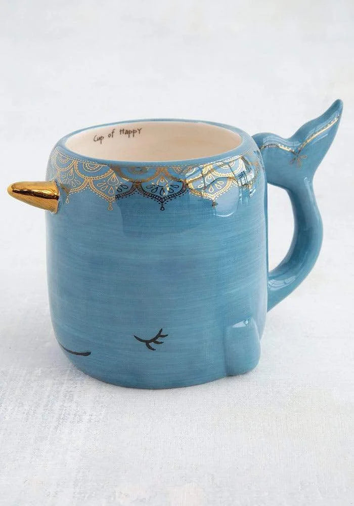 Blue whale shaped mug with gold detailing, featuring Narwhal Folk Art design