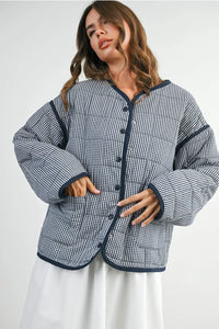 Buttoned quilted puffer jacket in blue and white checkered with bell sleeves