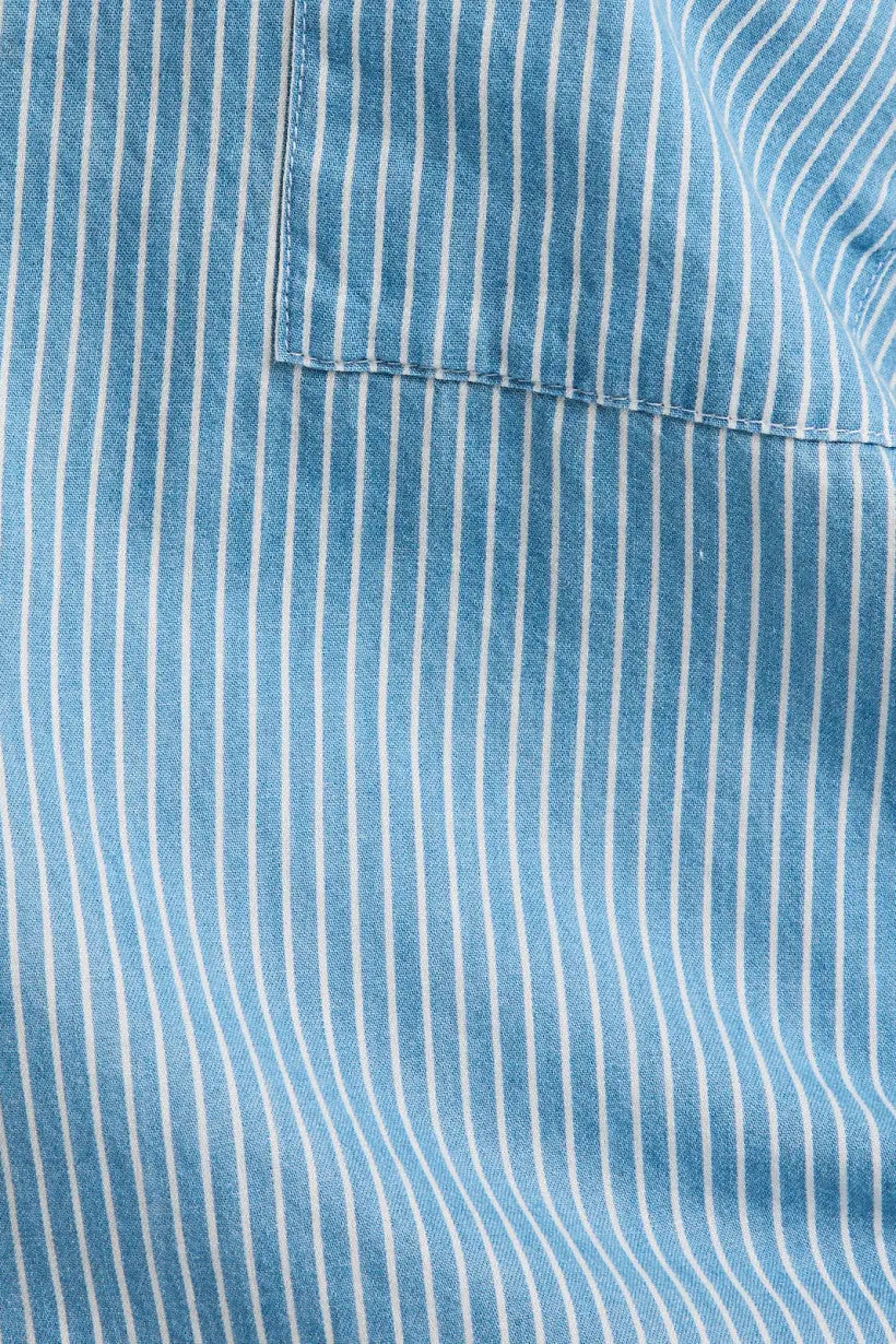 Blue and white striped fabric of a 3/4 sleeve stripe chambray shirt