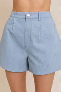 Blue and white striped shorts from ELASTIC BACK DENIM STRIPE SHORTS, perfect for women’s boho chic clothing at Shop Daisy