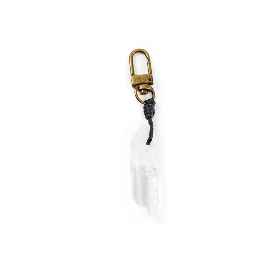 Brass padlock with a tag on a Crystal Point Keychain featuring Clear Quartz Crystal