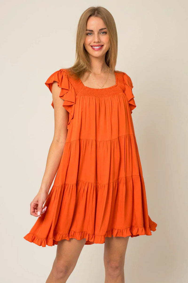 Bright orange Ruffle Sleeves Tiered Mini Dress with short flutter sleeves displayed