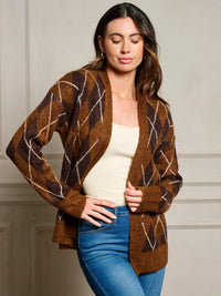 Brown argyle cardigan sweater styled over a light top and jeans, ideal long sleeve sweater