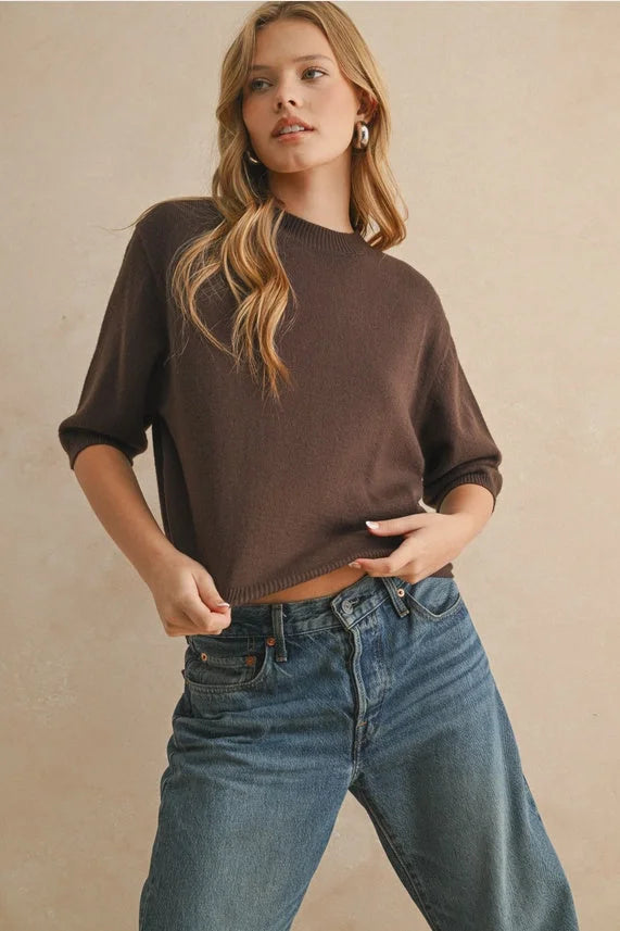 Brown short sleeve sweater top with three-quarter sleeves and ribbed neckline