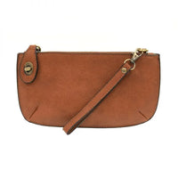 Brown leather clutch purse with detachable wrist strap and card slots from Shop Daisy