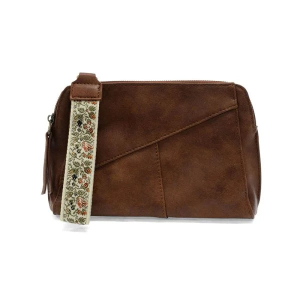 Brown vegan leather Gigi crossbody bag with woven wristlet strap and zip closure