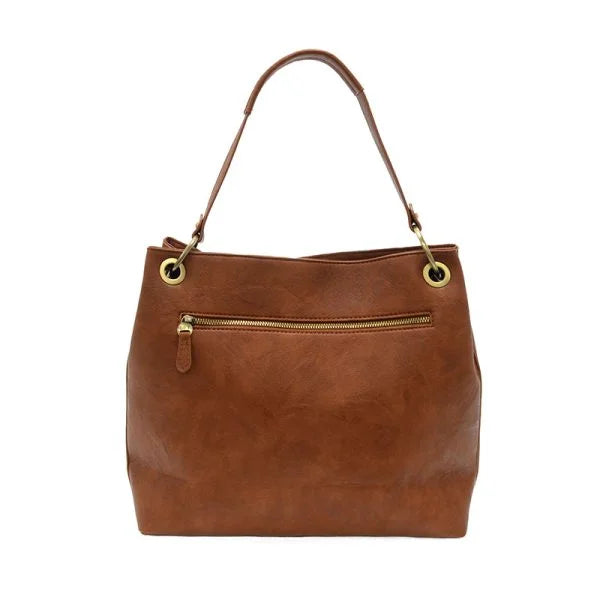 Brown leather handbag with gold hardware, a front zip pocket, shop Daisy for vegan leather