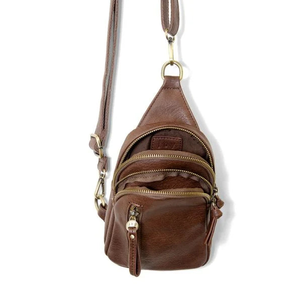 Brown leather Skyler Sling Bag with zippered compartments and shoulder strap