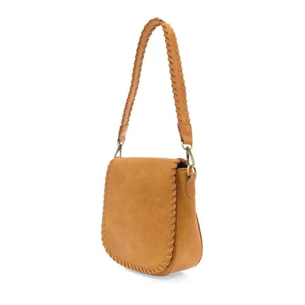 Brown leather shoulder bag with braided trim and adjustable shoulder strap for versatile use