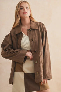 Brown suede button front oversized utility jacket with patch pockets. Shop Daisy women’s boho chic clothing