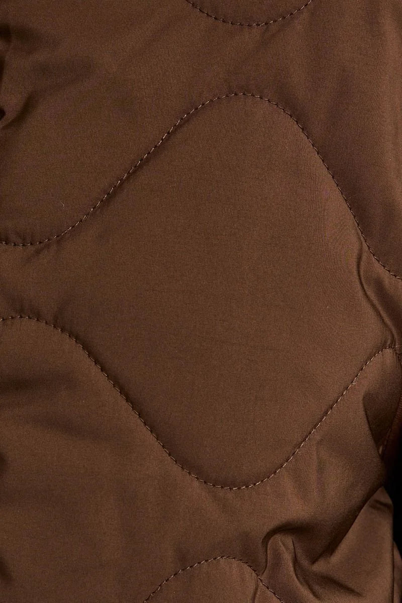 Brown padded round neck quilted jacket with plush texture