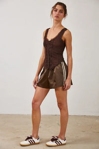 Brown sleeveless V-neck top with mesh lace button closure and matching mini skirt