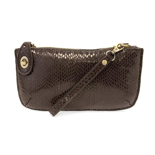 Python mini wristlet clutch in brown snakeskin with gold hardware and card slots