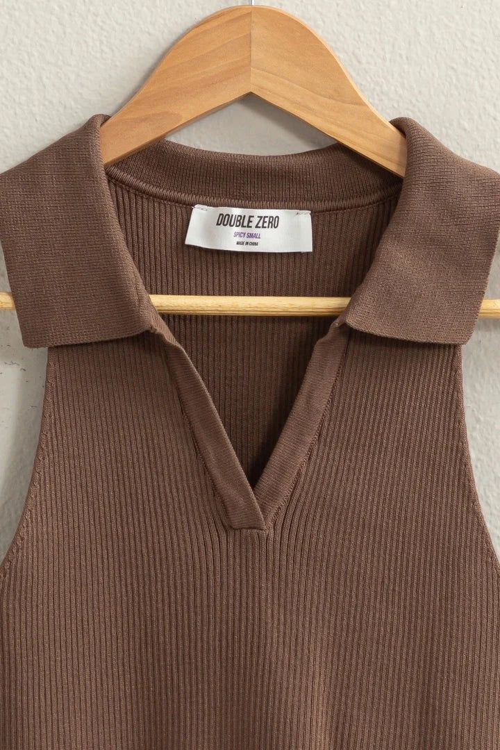 Brown sweater with collar and white button from the Sleeveless Collared Crop Knit Top