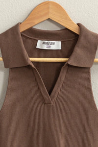 Brown sweater with collar and white button from the Sleeveless Collared Crop Knit Top