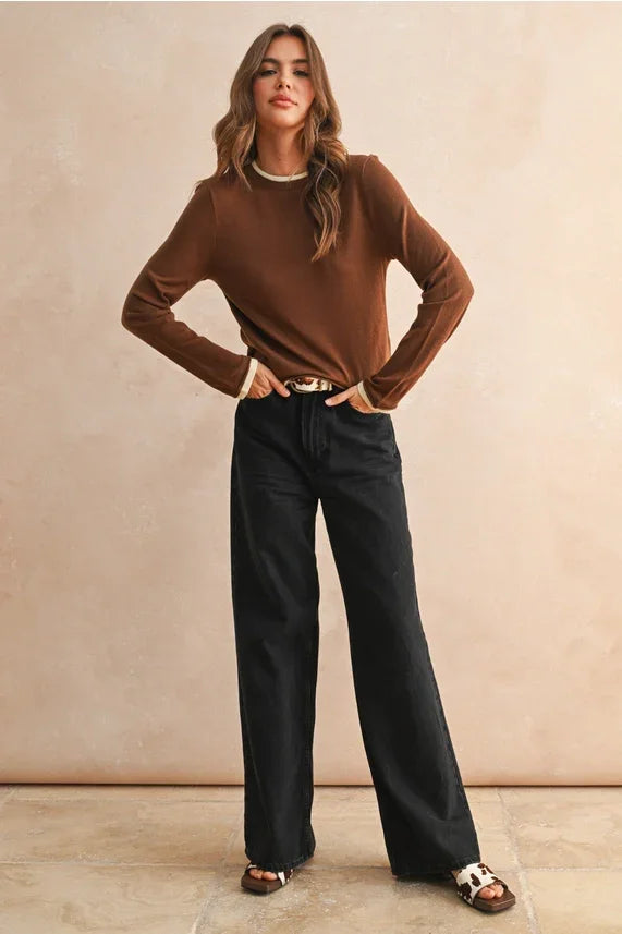 Women’s long sleeve layered knitted top with brown sweater and black wide-leg pants