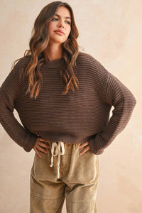 Round neck knitted sweater in brown texture with drawstring hem and corduroy pants