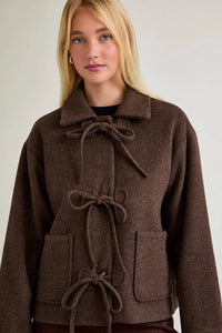 Brown woolen soft jacket with button bow detail and vintage duffle pockets