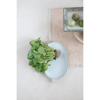 Fresh green watercress on a pale blue STONEWARE PLATTER WITH HANDLE for a boho vibe