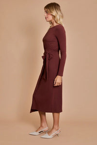 Burgundy long-sleeved midi dress with tie waist from Shop Daisy’s women’s boho clothes