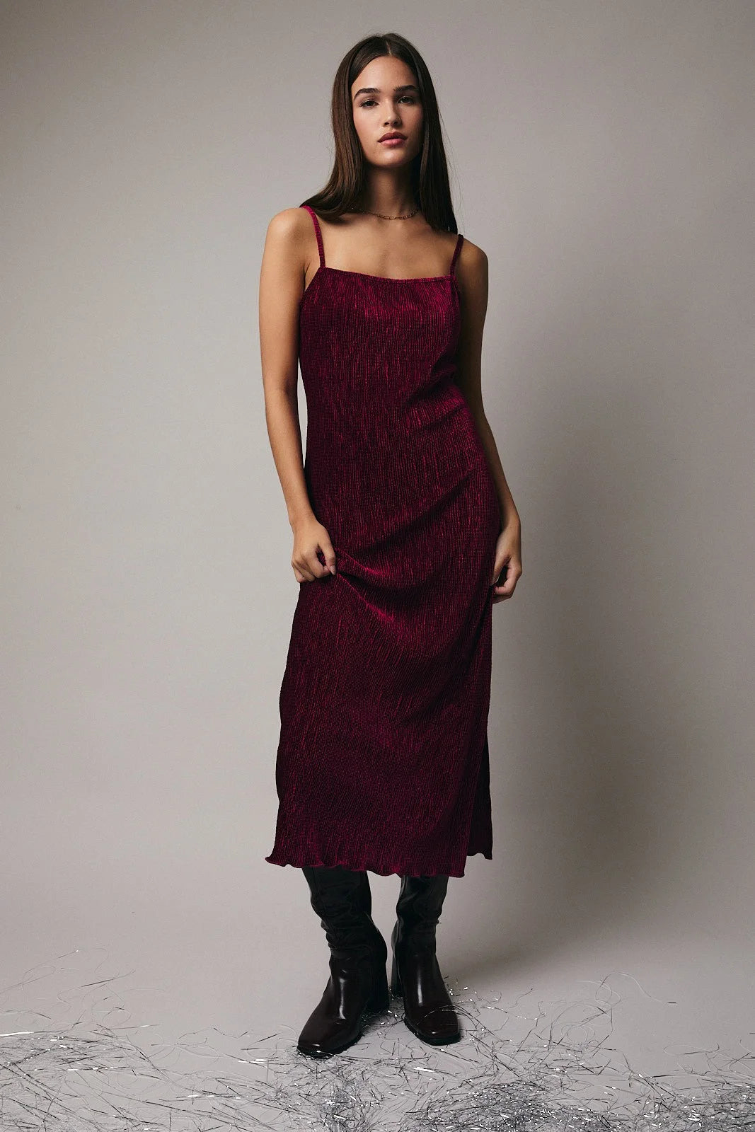 Sleeveless slim fit velvet midi dress in burgundy satin with black ankle boots