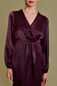 Burgundy satin wrap dress with balloon sleeves, ideal as a formal dinner dress