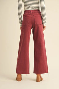 Burgundy straight wide leg denim pants with raw hem in the STRAIGHT WIDE LEG DENIM PANTS collection