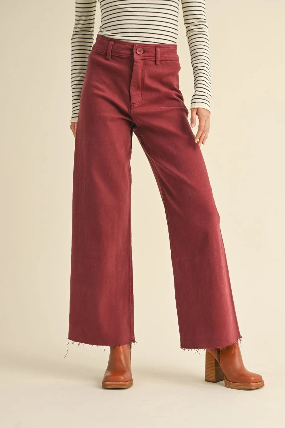 Burgundy straight wide leg denim pants with frayed hem for a stylish look