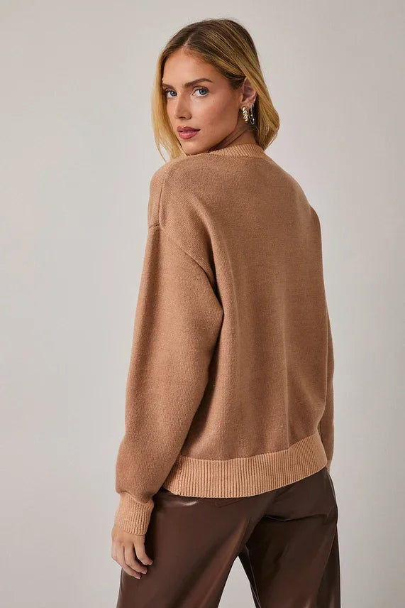 Camel-colored crew neck long merry sweater with ribbed edges