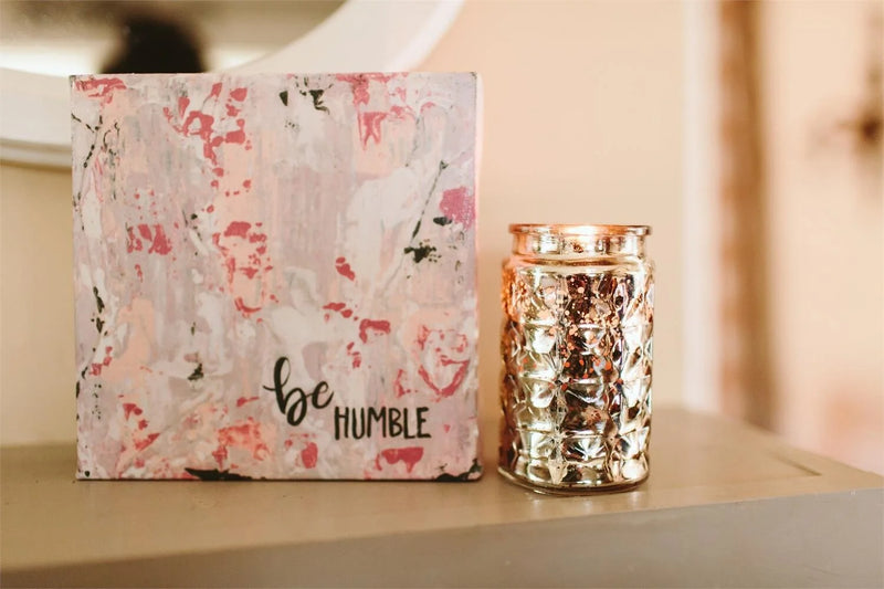 Sweet Grace Passion Fruit & Sparkling Tea Candle displayed on a table with a box