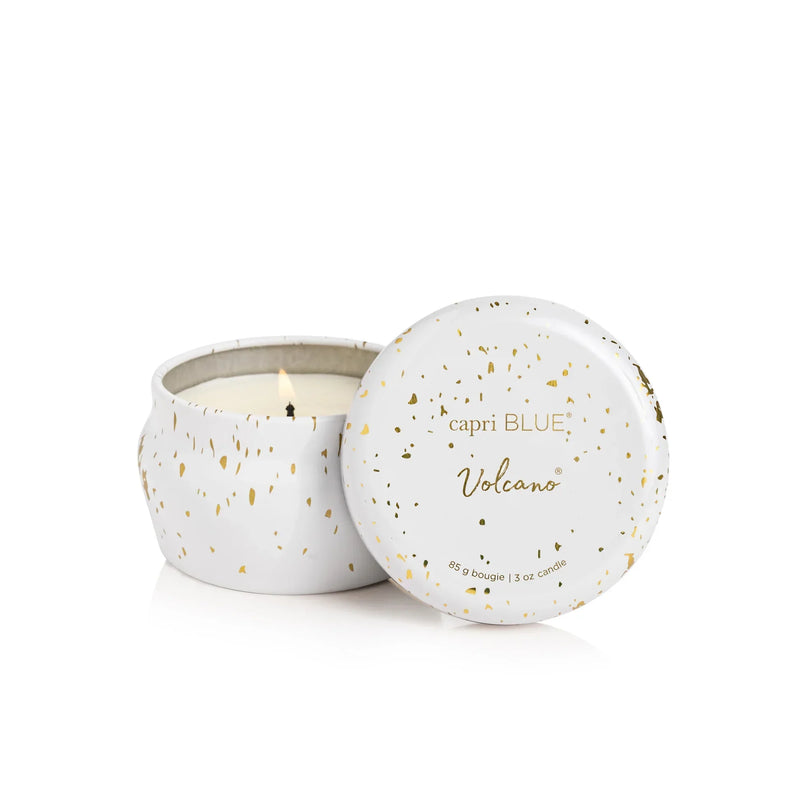 Capri blue Volcano Glimmer Mini Tin Candle in speckled white ceramic jar with gold accents