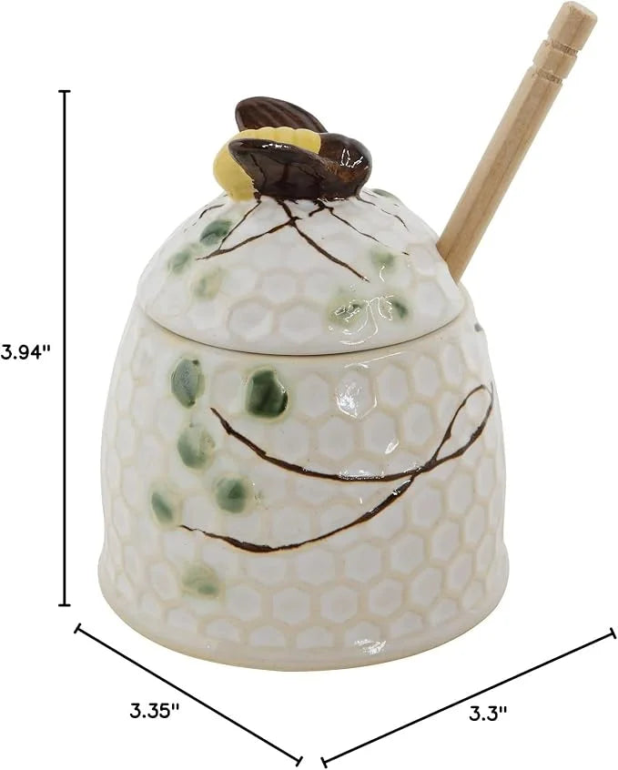 Hand painted honey jar with bee design, featuring a honey dipper and ceramic beehive shape