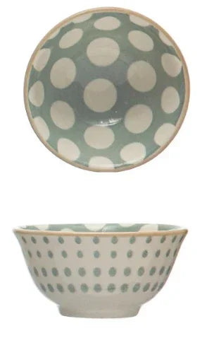 Ceramic stoneware pinch pot featuring a sage green and cream polka dot pattern