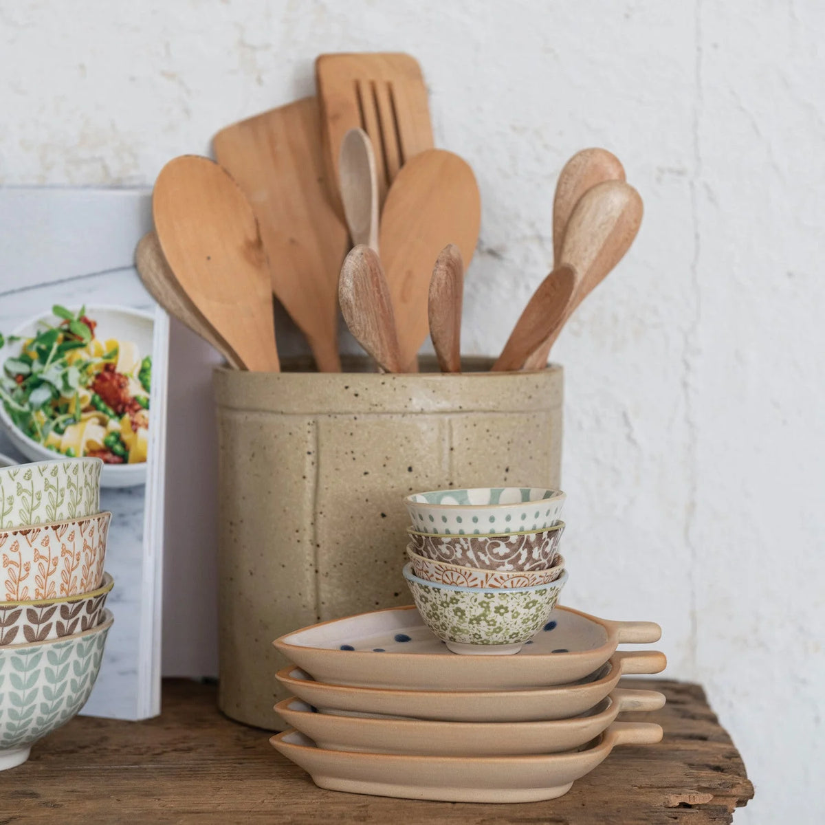 Ceramic container with wooden kitchen utensils in a Stoneware Pinch Pot with Pattern