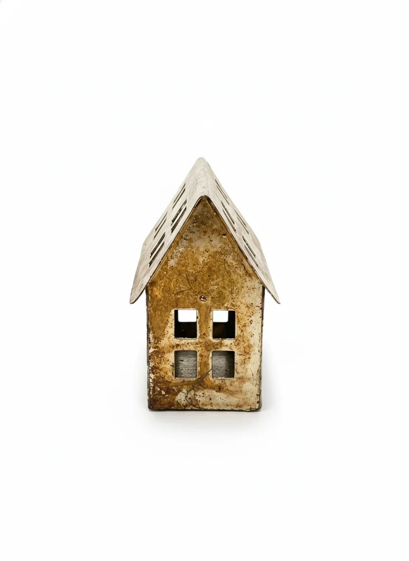 Weathered ceramic house figurine with white roof, rustic bohemian metal decorative holiday house