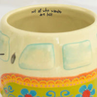 Ceramic Folk Art Coffee Mug featuring colorful floral patterns and an inspiring quote