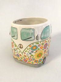 Colorful hand sculpted Ceramic mug shaped like a boho Volkswagen bus with peace symbol