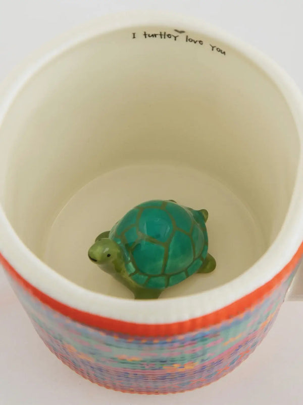 Ceramic coffee mug with turtle figurine from Natural Life for women’s boho chic clothing