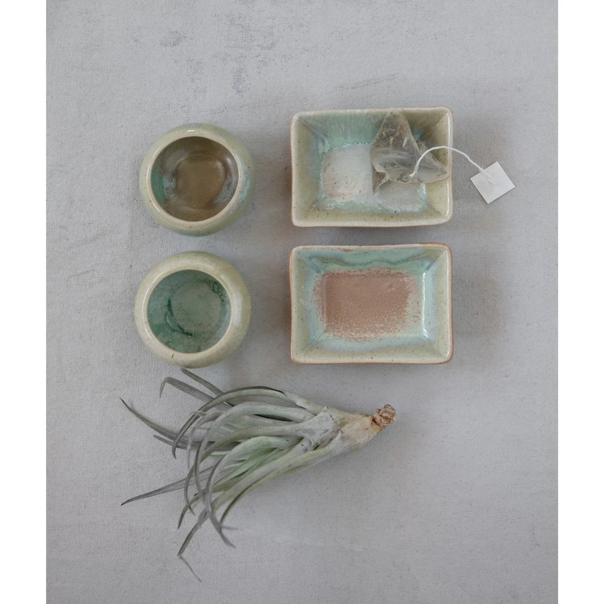 Ceramic soap dishes and containers showcasing an Opal Reactive Glaze Stoneware Dish